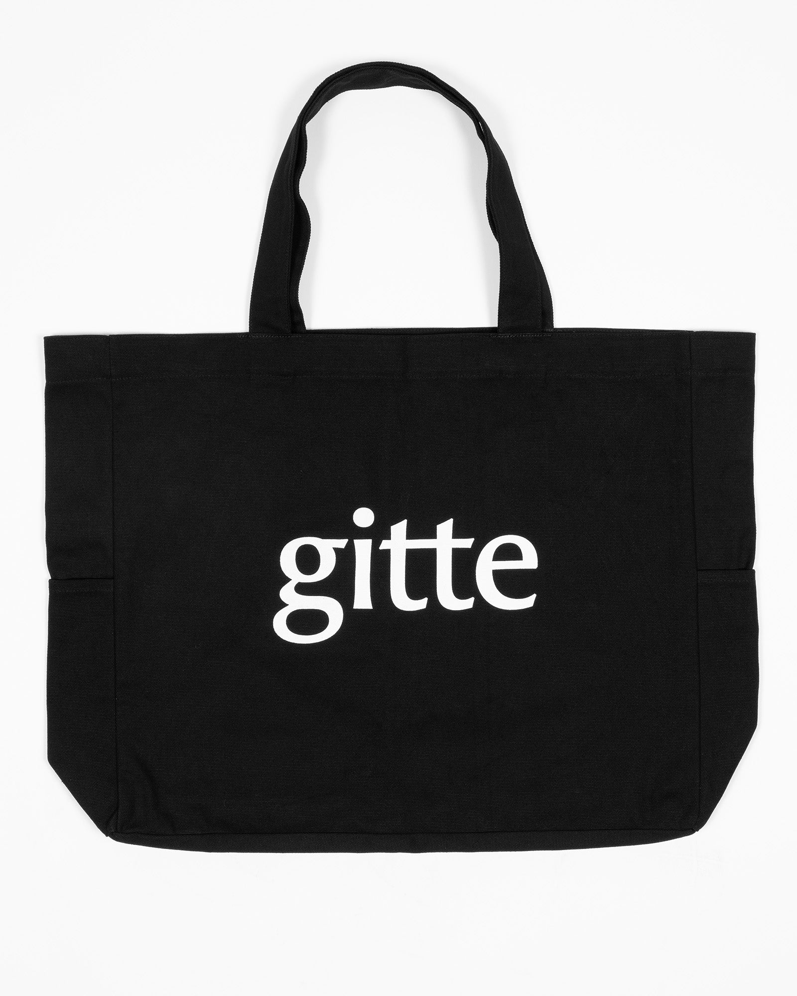 Black tote bag with 'gitte' printed on a white background